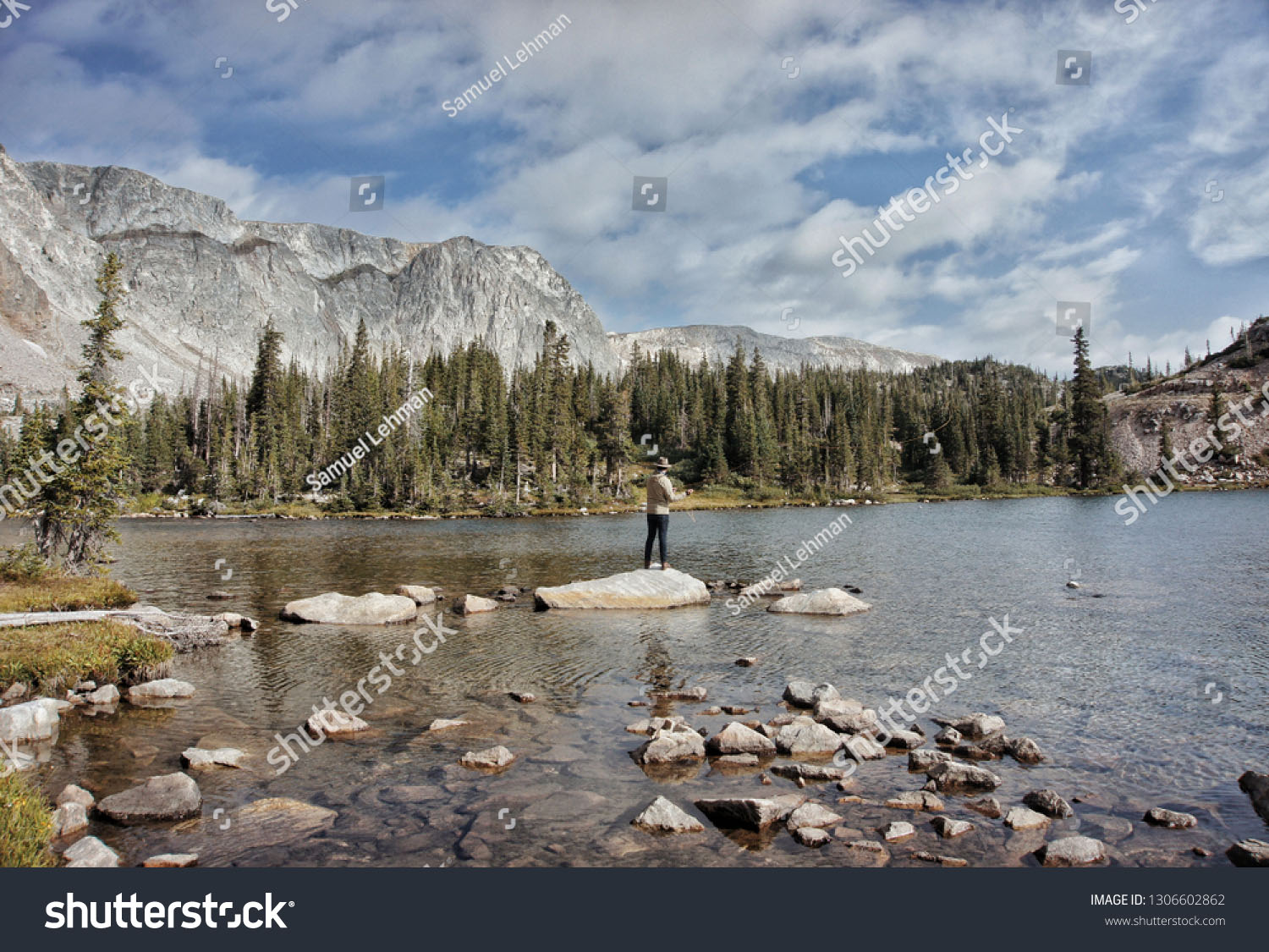 stock photo fly fisherman fishing remote backcountry high alpine lake fishing in wyoming colorado montana 1306602862